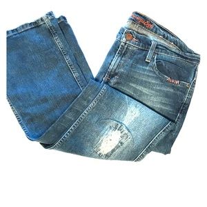 Distressed boot cut jeans